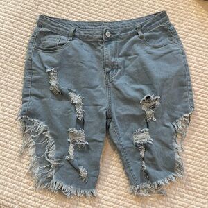 Ripped jean stretchy shorts in light blue
